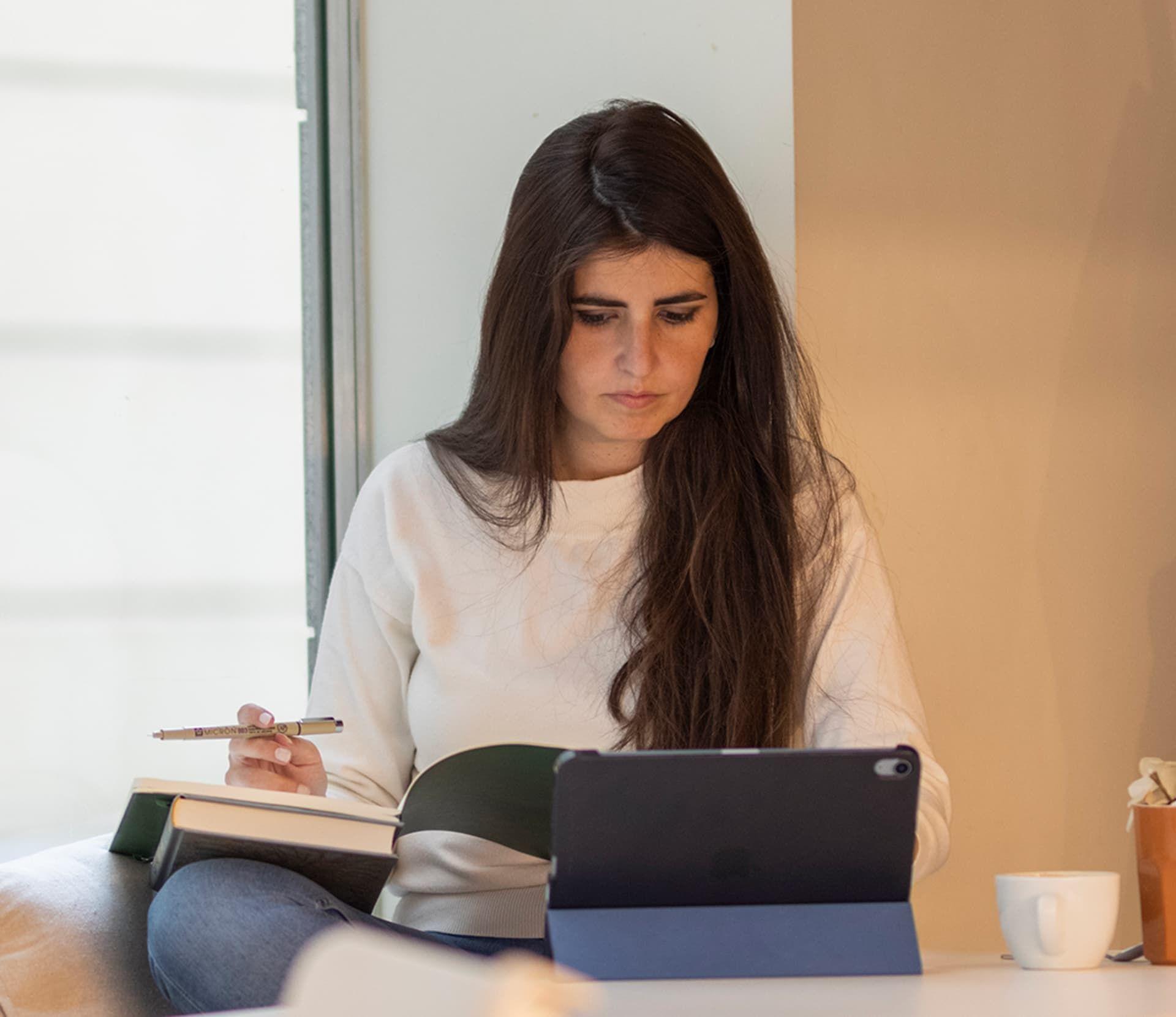 female freelancer working from her tablet