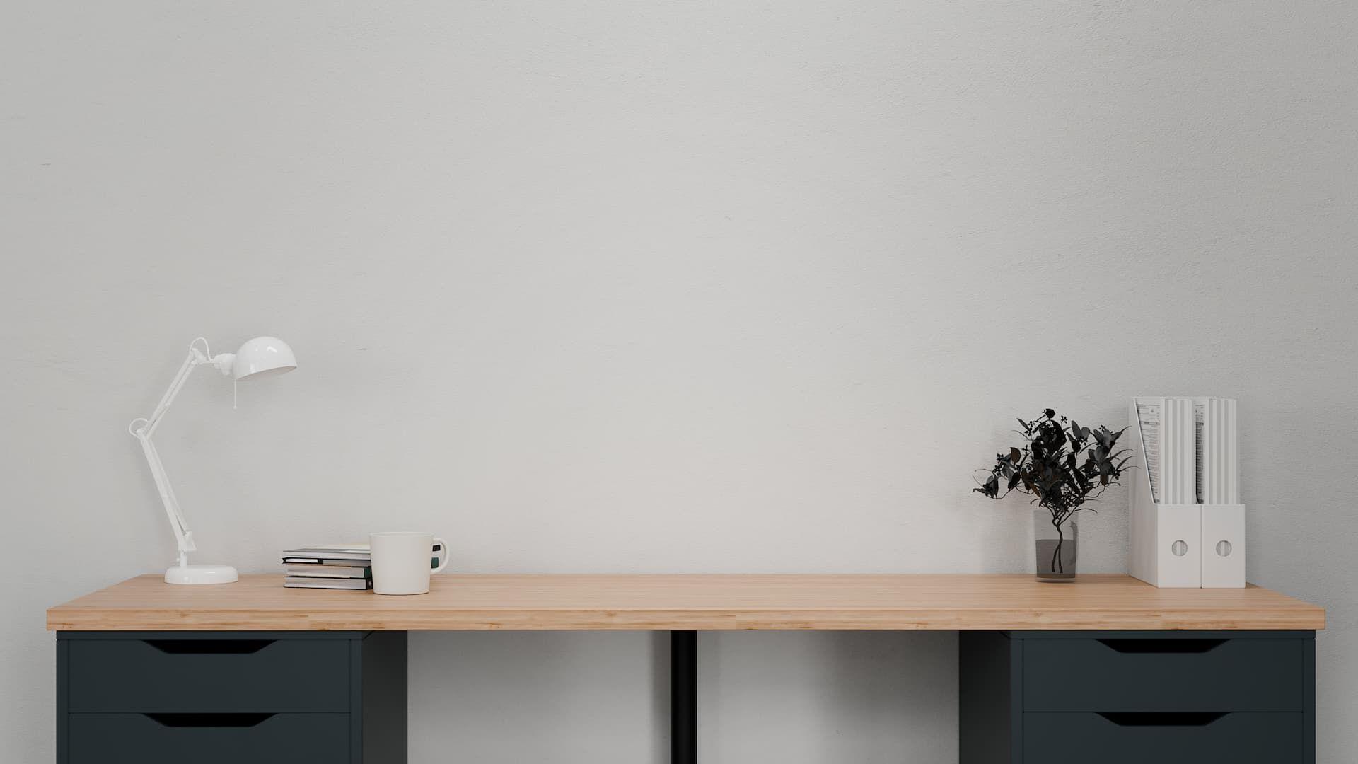 minimalist workspace facing a wall