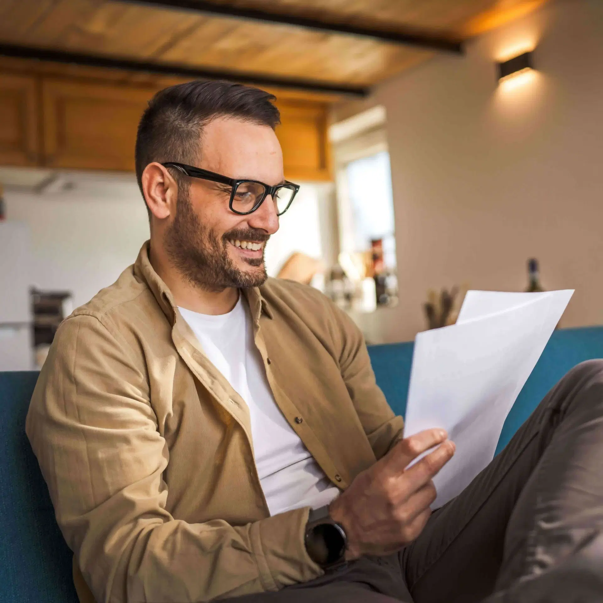 happy man reading document