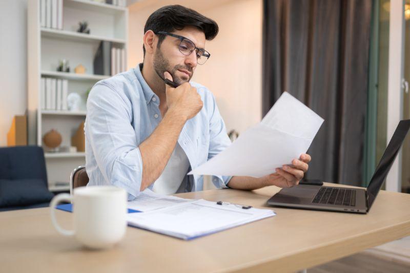 Freelancer having a careful contract review