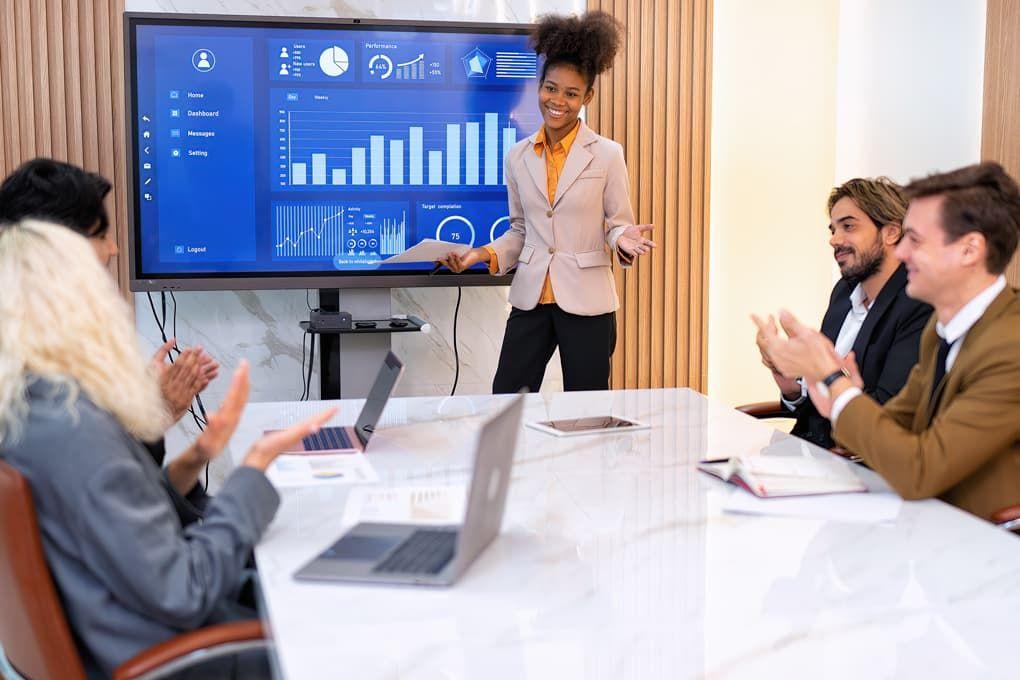People speaking at a business presentation