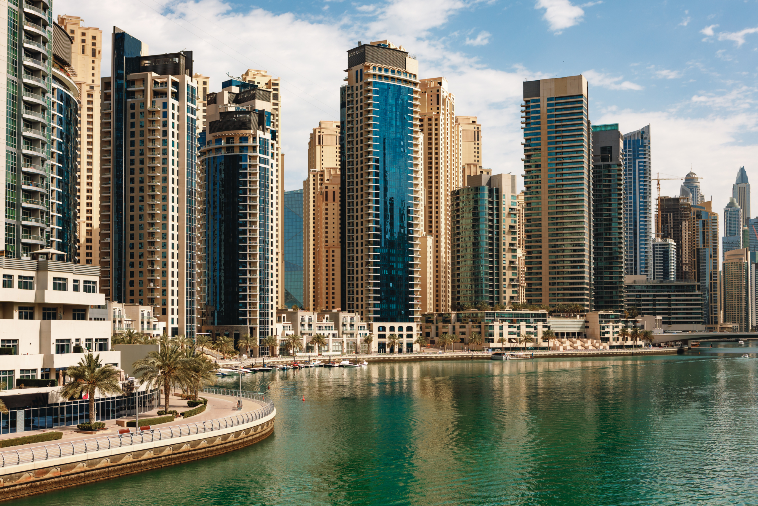 Dubai Marina skyscrapers and port in Dubai, United Arab Emirates background