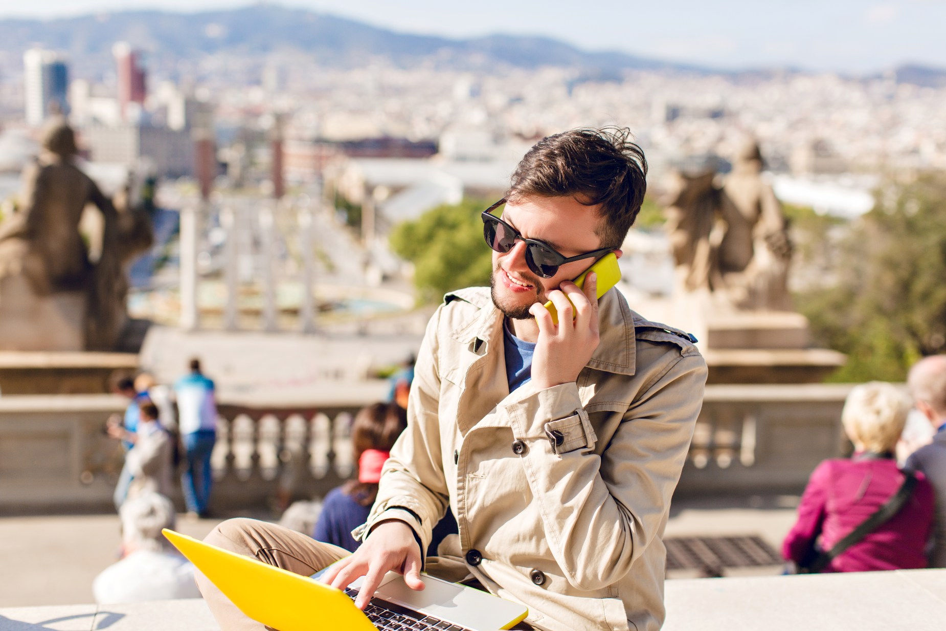 portrait-of-young-guy-in-beige-coat-sitting-on-hig-2026-01-05-04-25-29-utc
