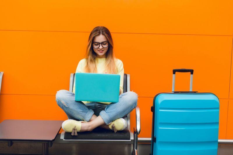 Illustration of a freelancer working remotely with a laptop, representing the best countries to work remotely in Europe.